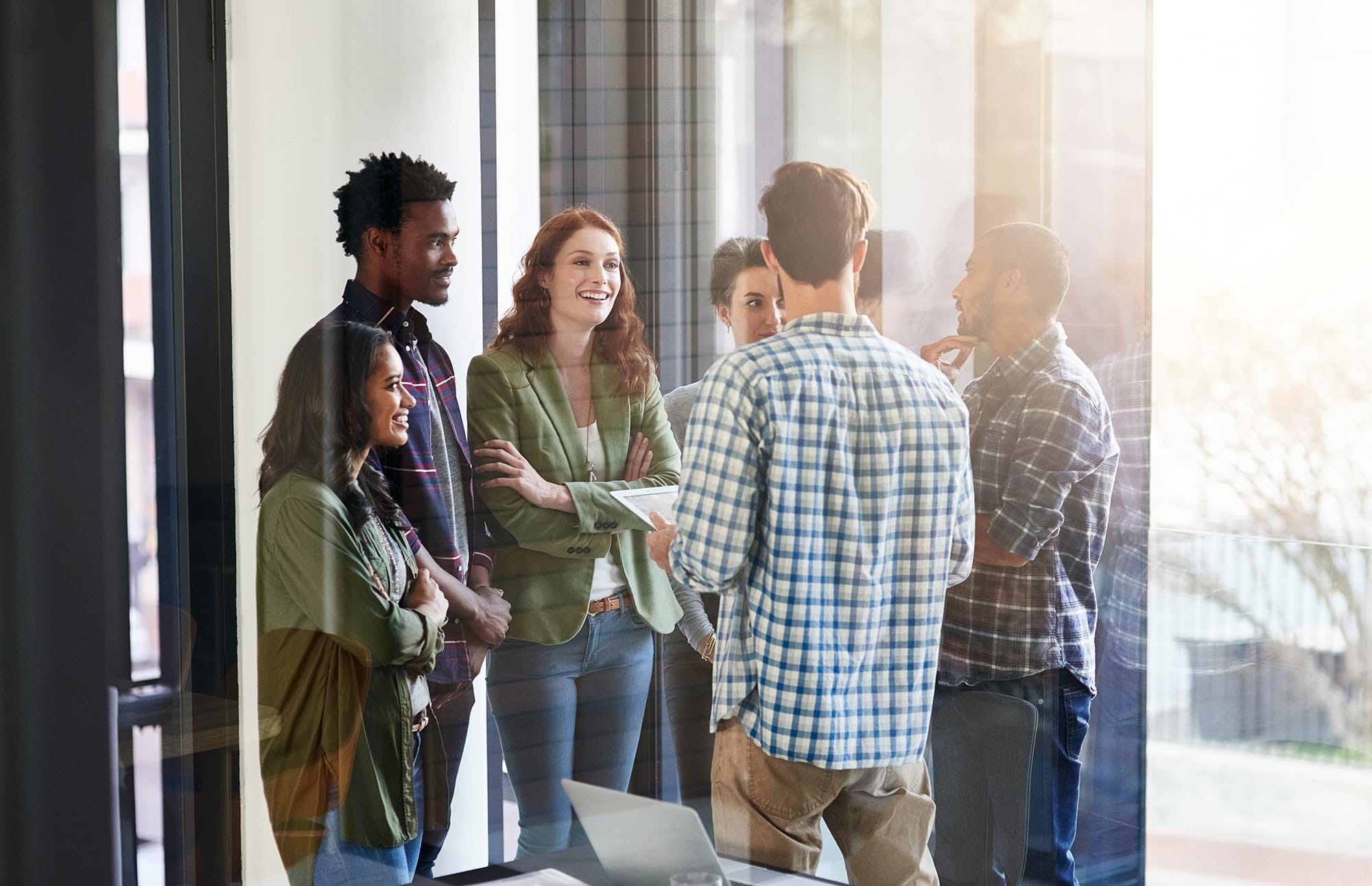 A team meeting at our Derby Office